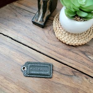Coach grey hang tag pendant bag charm